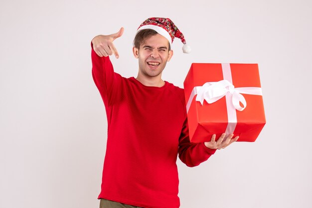 Front view blissful young man standing on white 