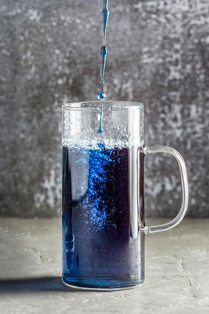 Free photo front view of blue tea concept