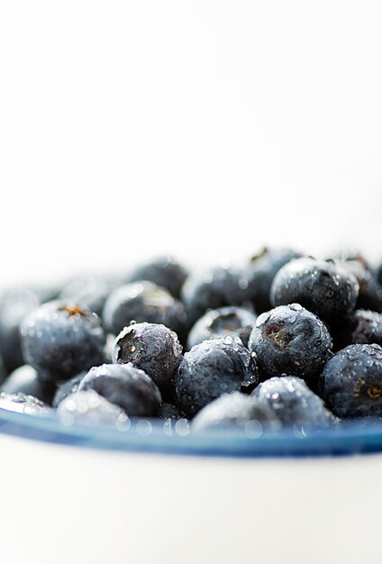 Front view blueberries in bowl copy space