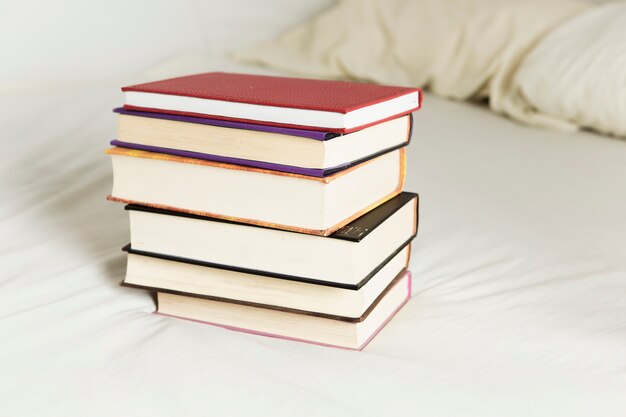 Front view of book arrangement on bed