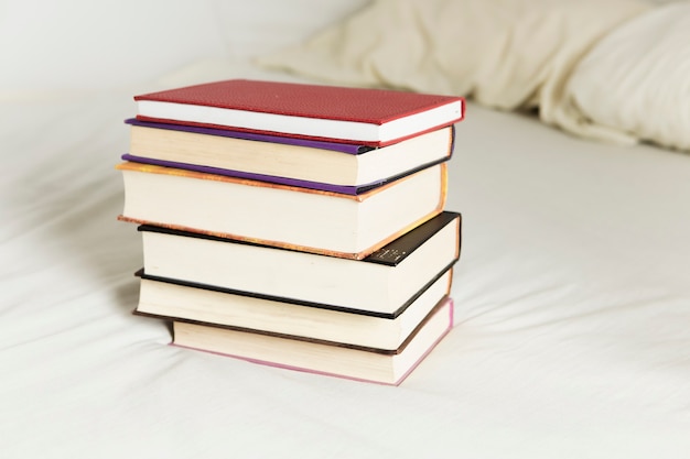 Front view of book arrangement on bed