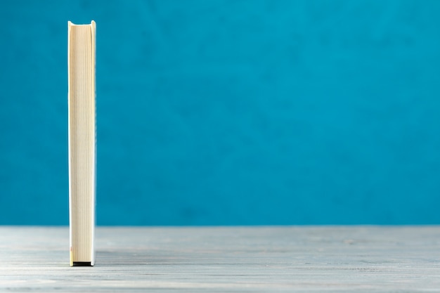 Front view book with blue background