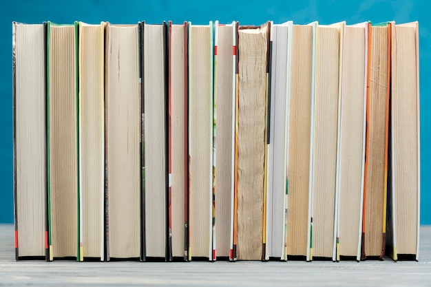 Front view books with blue background