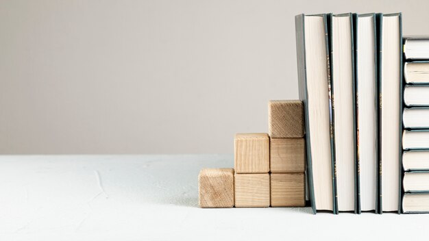 Front view books with wooden stand