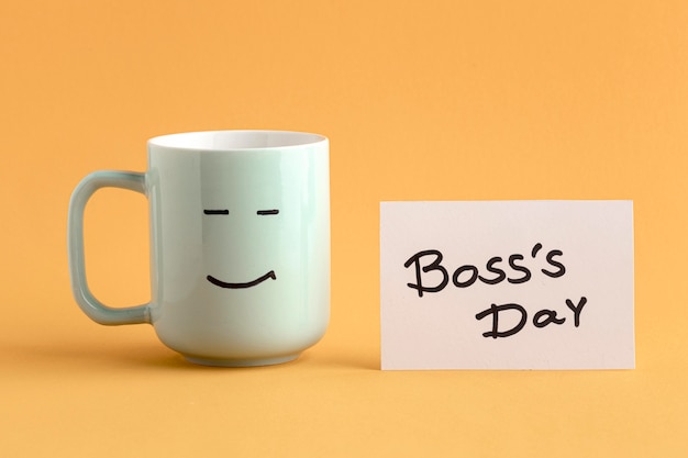 Front view of boss day concept with cups