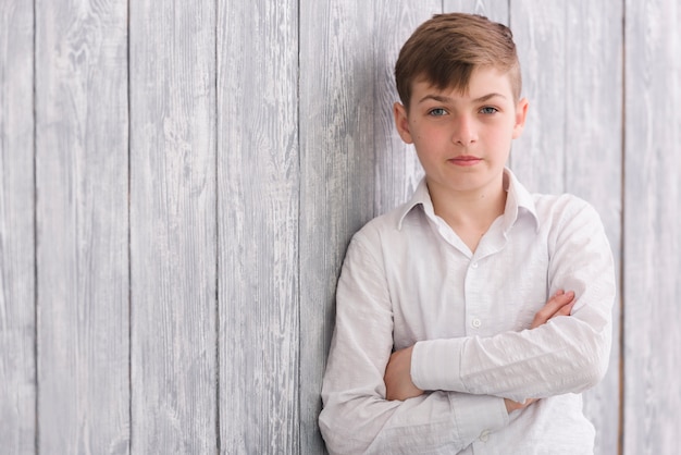 Free photo front view of boy looking at camera