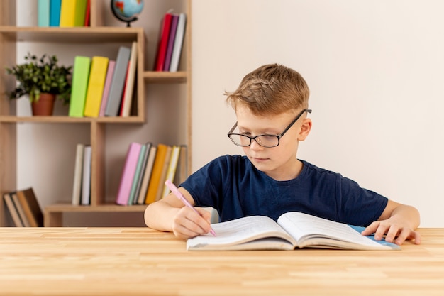 Front view boy reading