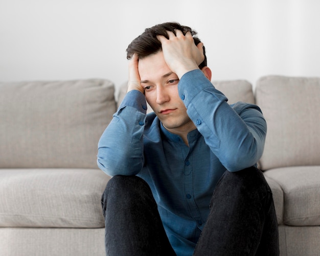 Free photo front view of boy with anxiety