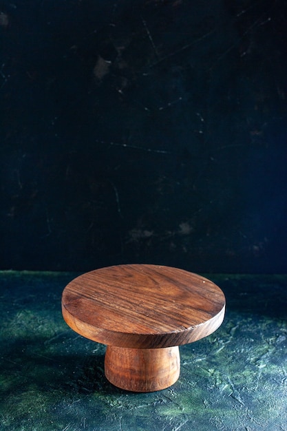 Front view brown wooden desk on dark blue wood color photo kitchen table