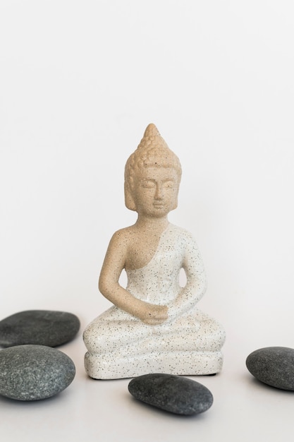 Free photo front view of buddha statuette