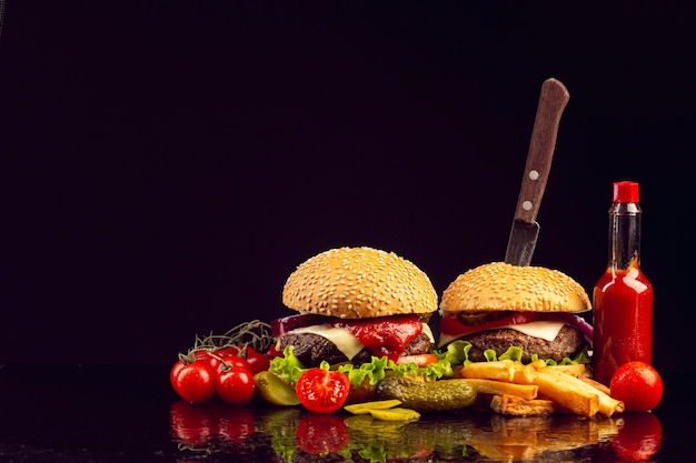 Free photo front view burger with french fries