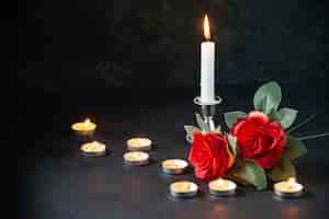 Free photo front view burning candles as memory for fallen dark surface