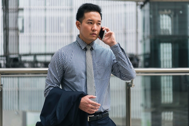 Front view of business man talking on phone