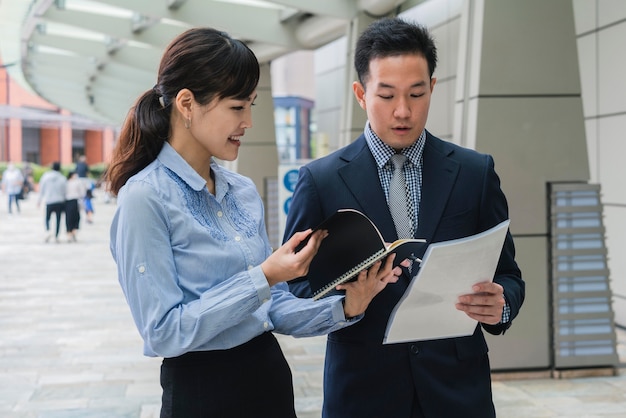 Free photo front view of business man and woman