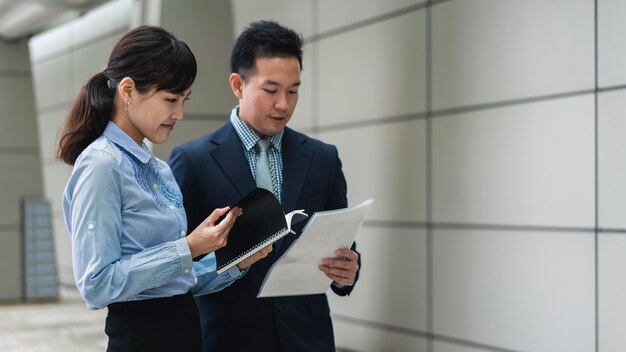 Front view of business man and woman