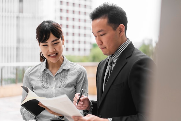 Free photo front view of business man and woman