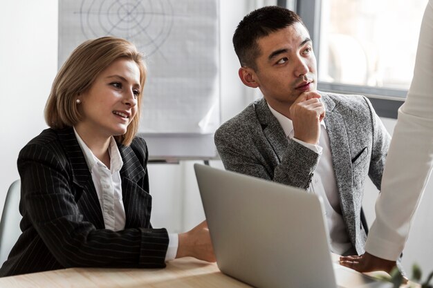 Front view of business people at work