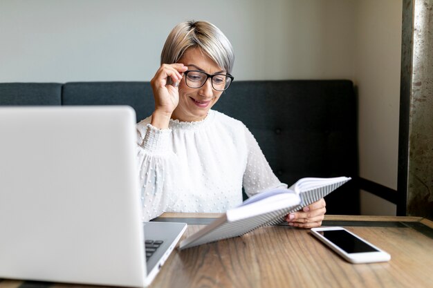 Front view business woman at office