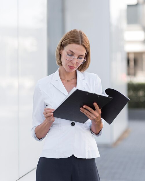 Front view business woman wearing glasses