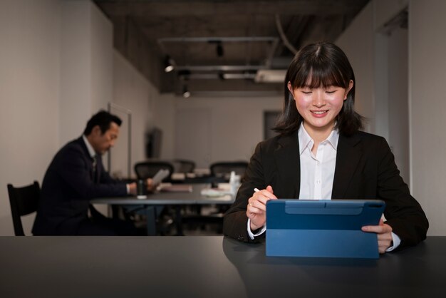 Front view business woman working on ipad