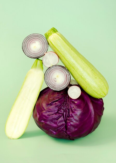 Front view of cabbage with onion and zucchini