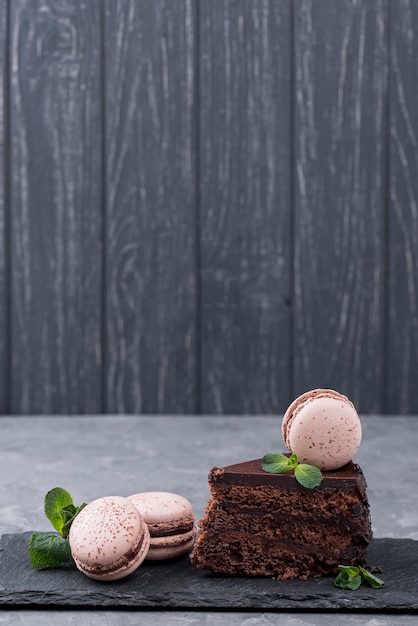 Front view of cake with macarons and copy space