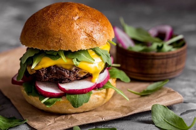 Front view cheeseburger on counter