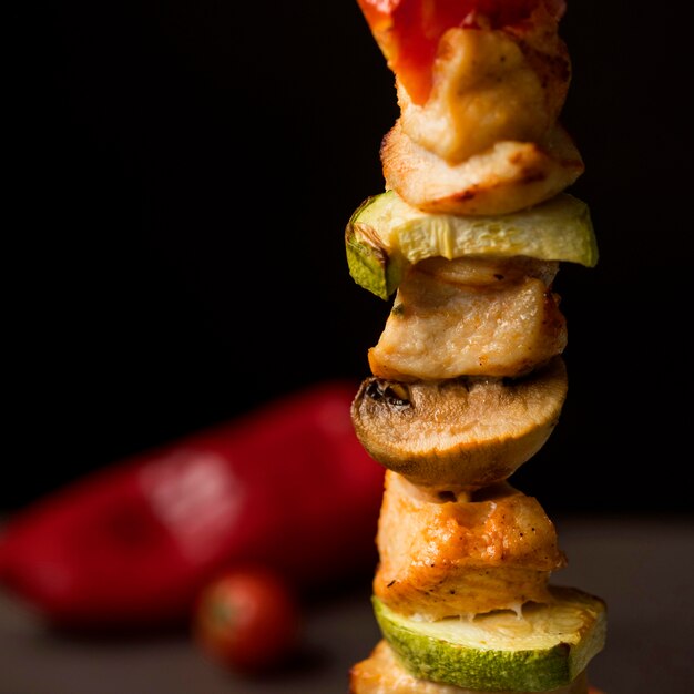 Front view chicken skewer with red pepper