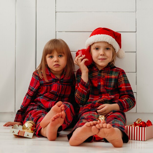 Front view children having fun on christmas