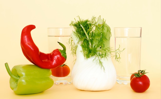 Front view of chili pepper with radish and tomato