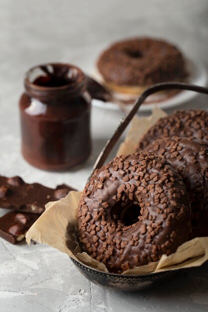 Front view chocolate doughnuts arrangement