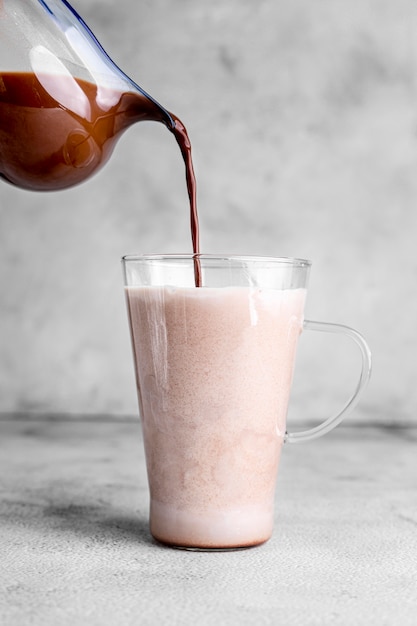 Front view of chocolate milk in cup