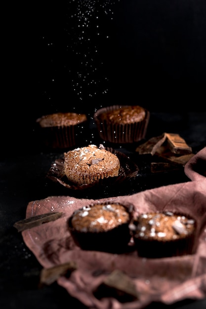 Free photo front view of chocolate muffin with copy space