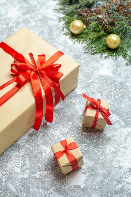 Front view christmas presents with red bows on white background