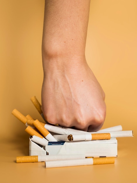 Free photo front view of cigarette bad habit concept