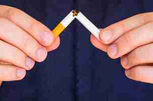 Free photo front view of cigarette bad habit concept