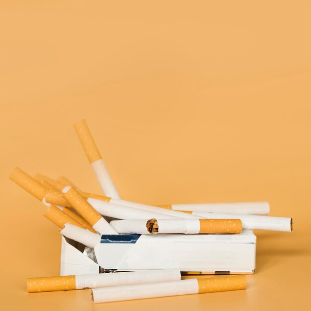 Front view of cigarette bad habit with copy space