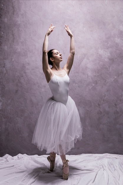 Free photo front view classic ballet posture