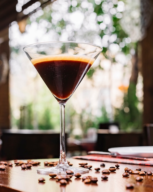 Front view cocktail with coffee grains