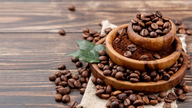 Front view of coffee beans on wooden table