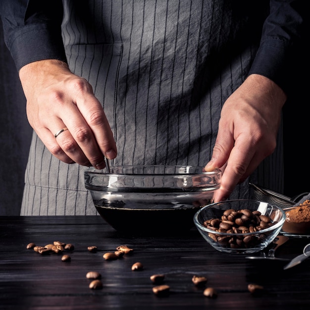 Front view of coffee in bowl on wooden table