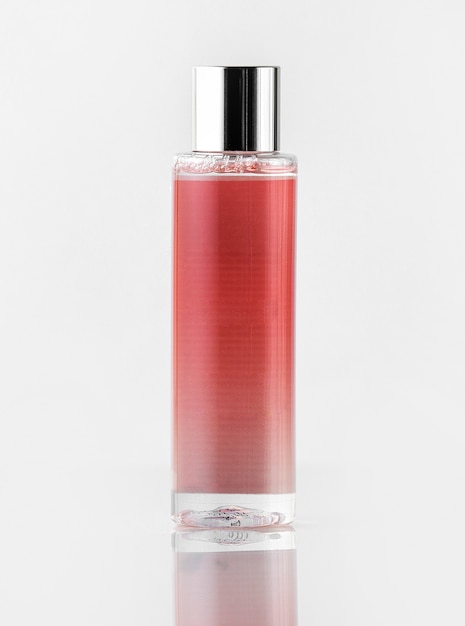 A front view colored fragrance designed isolated on the white floor