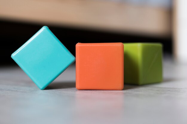 Front view of colorful cubes on floor