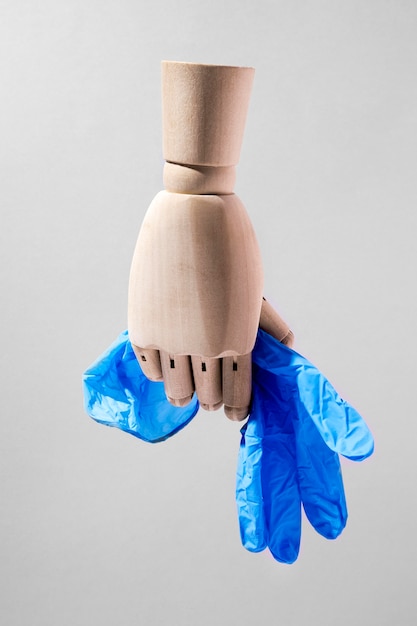 Front view of coronavirus concept with gloves