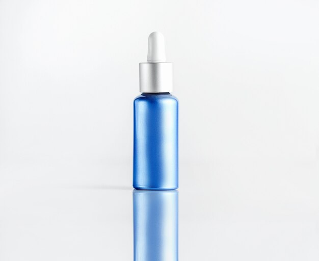 Front view cosmetic tube for serum blue tube with a white pipette cap