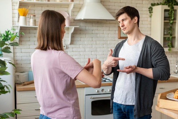 Front view of couple communicating