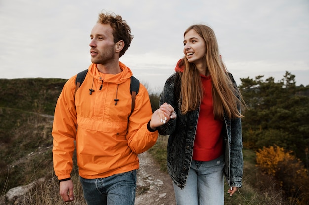 Front view of couple enjoying a road trip