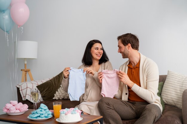 Front view couple at gender reveal party