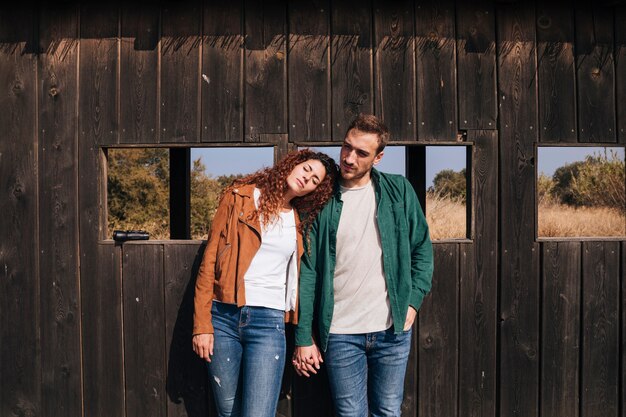 Front view couple holding hands