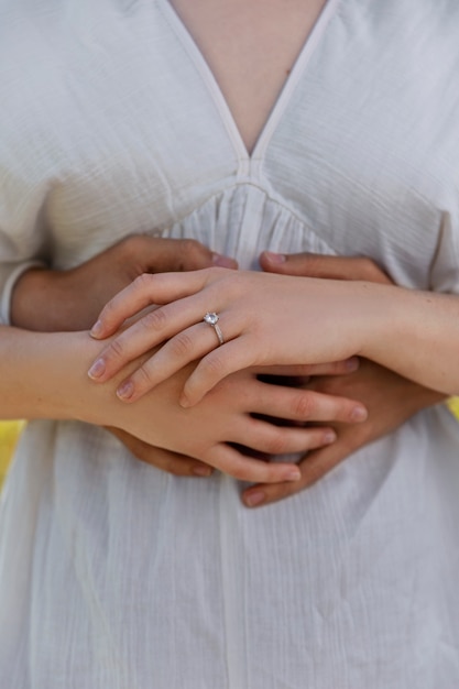 Front view couple holding hands